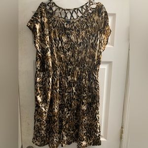Dot’s leopard print mini dress size 3X with black lining on bottom half.
